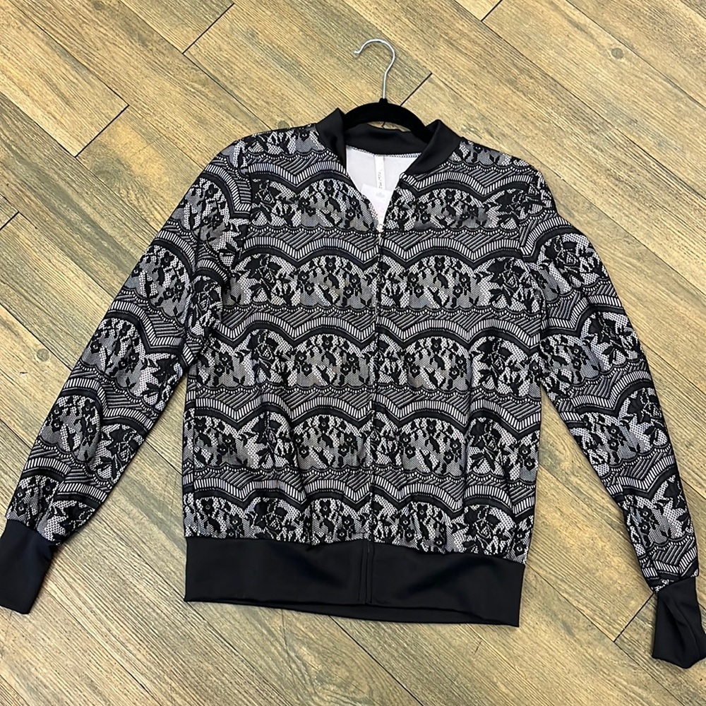 Junior size lace spring jacket.